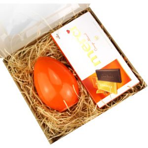 Prezent na Wielkanoc czekolada i świeczka jajko pomarańczowe